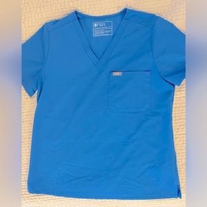 Figs Catrina one pocket top (M). Color- Capri blue